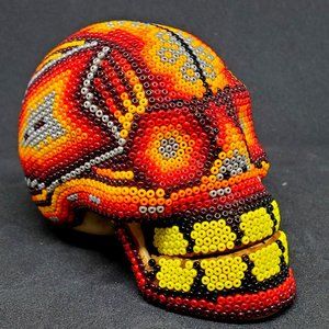 Huichol Beaded Skull on carved fish bone. ~ Handcrafted by Huichol artist